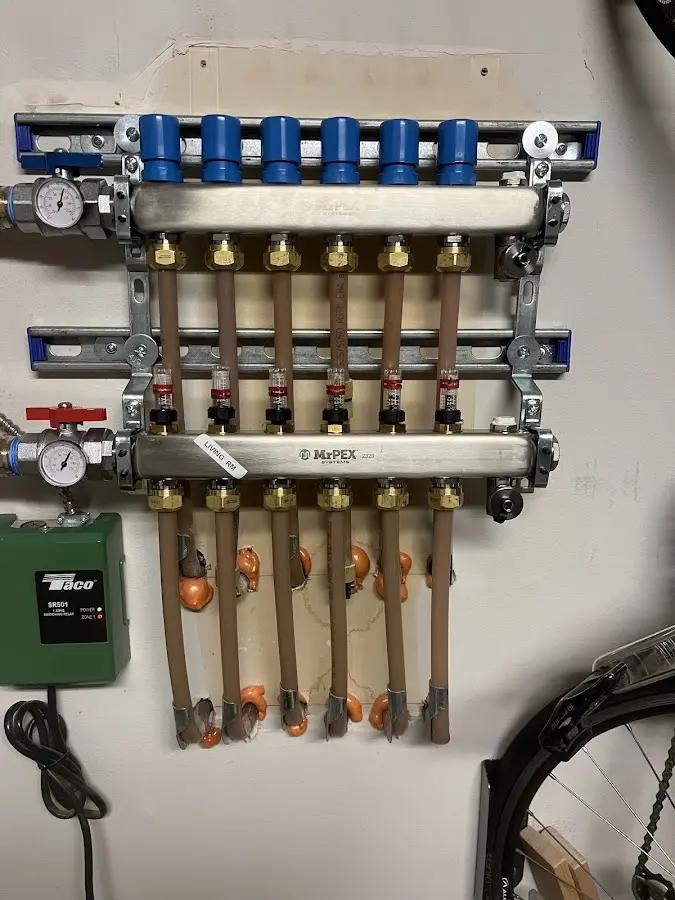 Plumber performing Leak Detection at a residential property in Hempstead